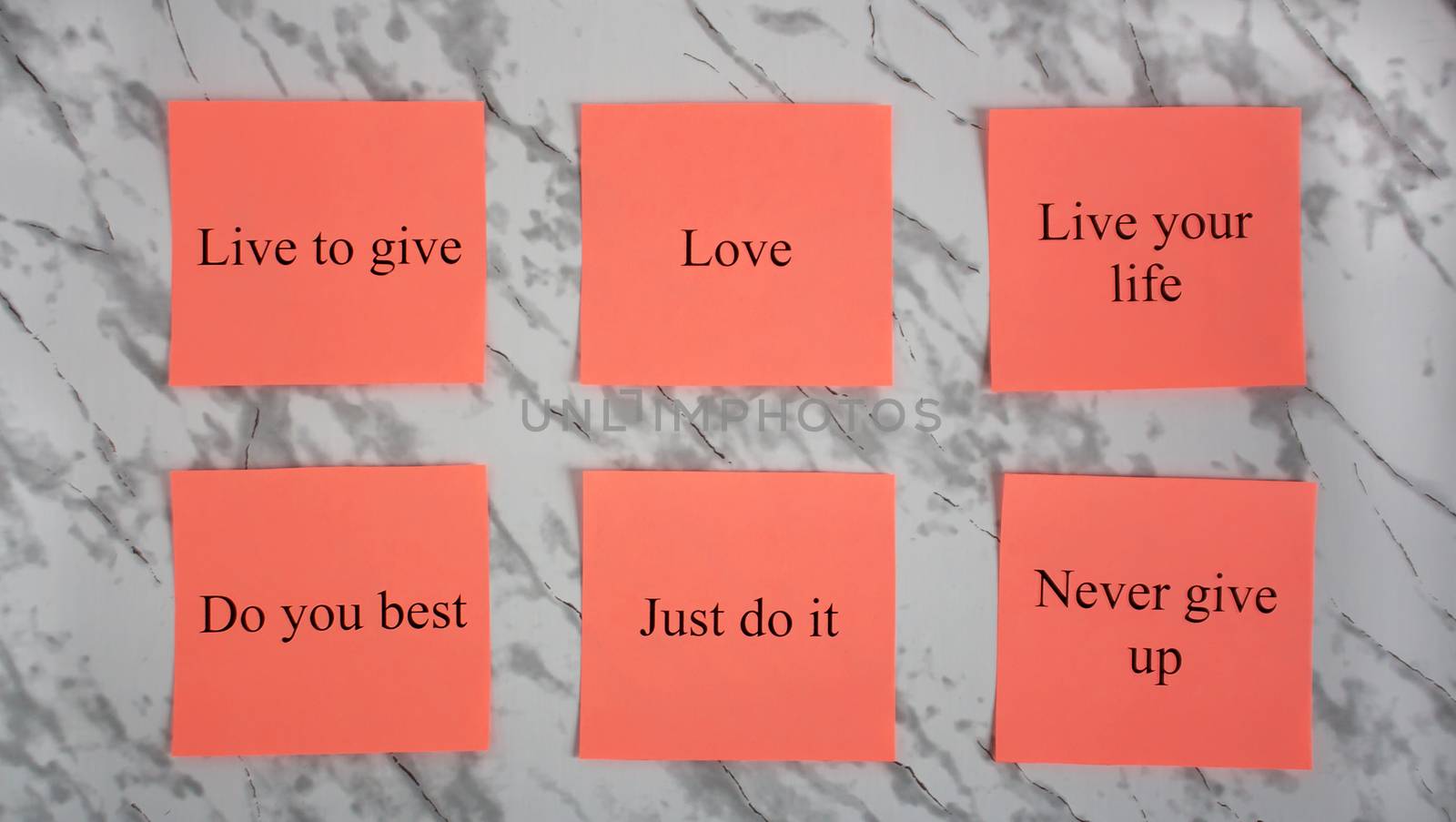 Motivational words on colored sheets of paper. Creativity and art. Study, education, work. Office, school, University. Stationery. Rainbow
