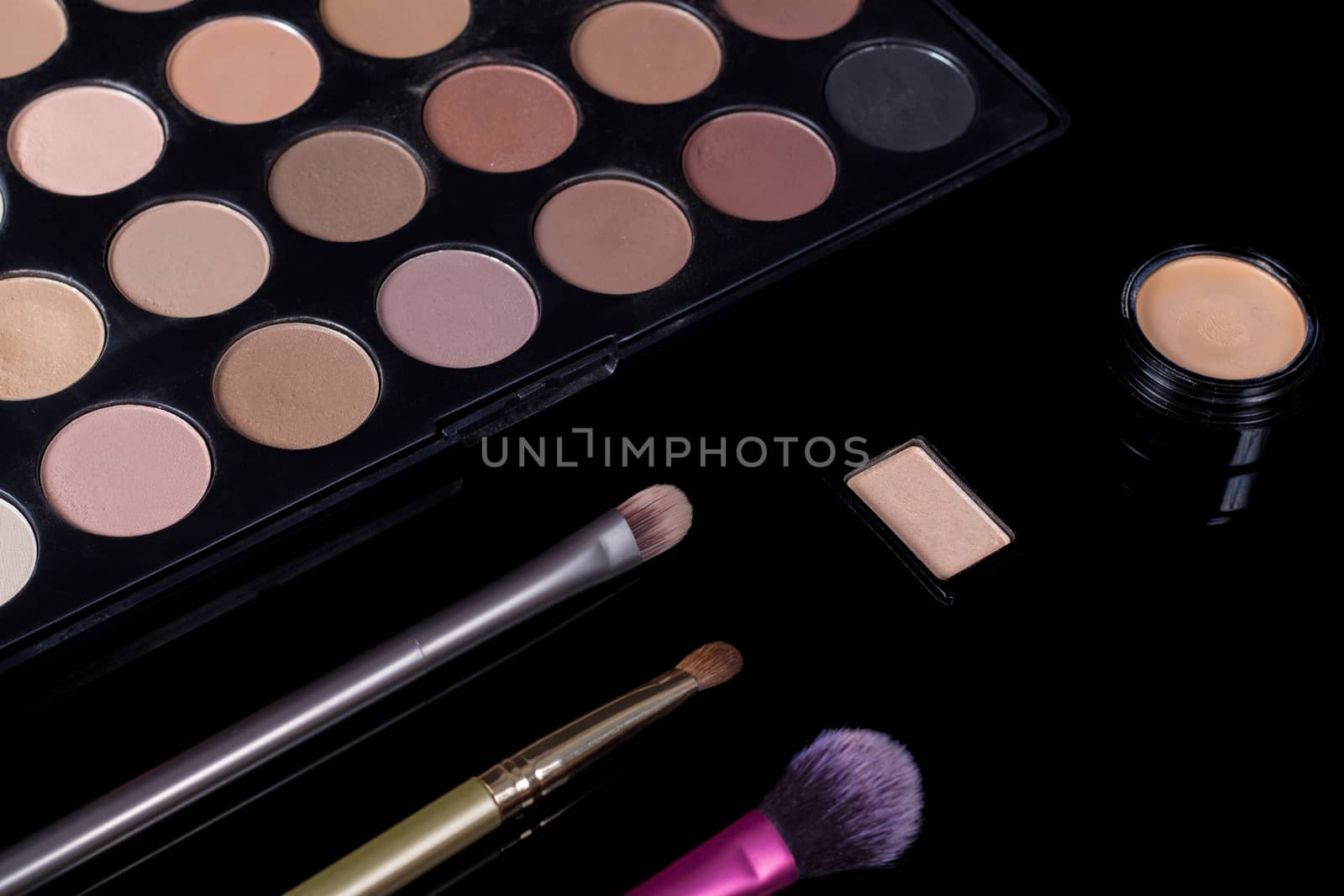 Make-up brushes. Eye shadow palette. Makeup kit. Cosmetic set. Beauty, fashion, style and skin care.