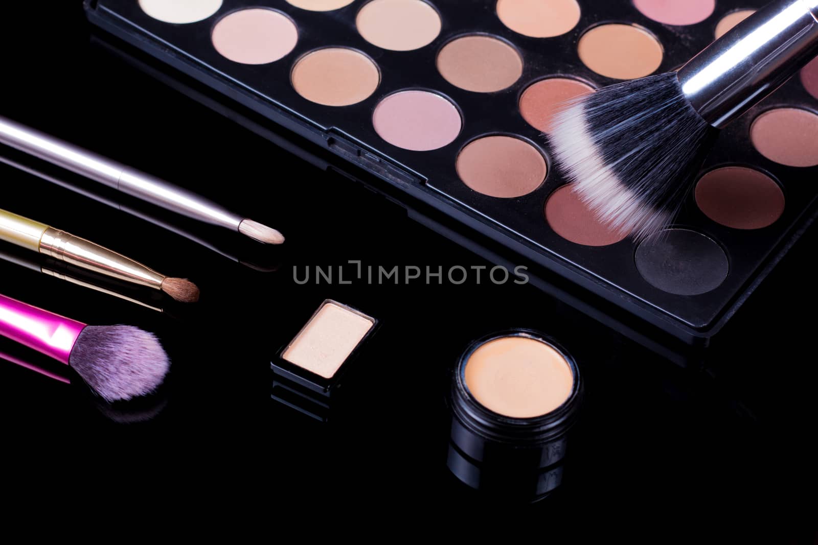 Make-up brushes. Eye shadow palette. Makeup kit. Cosmetic set. Beauty, fashion, style and skin care.