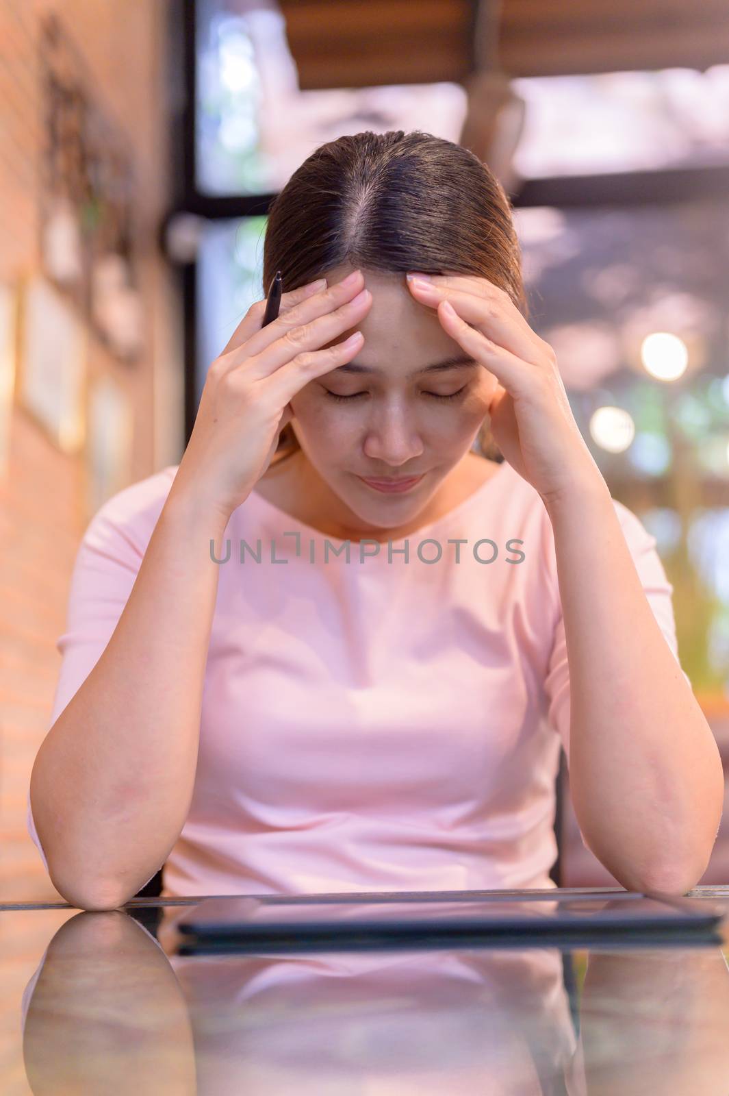 Unemployment and Mental health problem. Corona virus job losses in Asia. Thai businesswoman looking for new job on website. Post-traumatic stress disorder (PTSD).