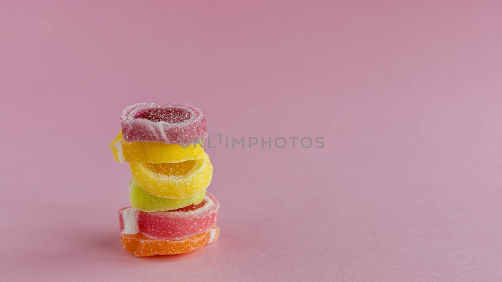 Colourful fruit Jelly candy on pink background for food and snack concept