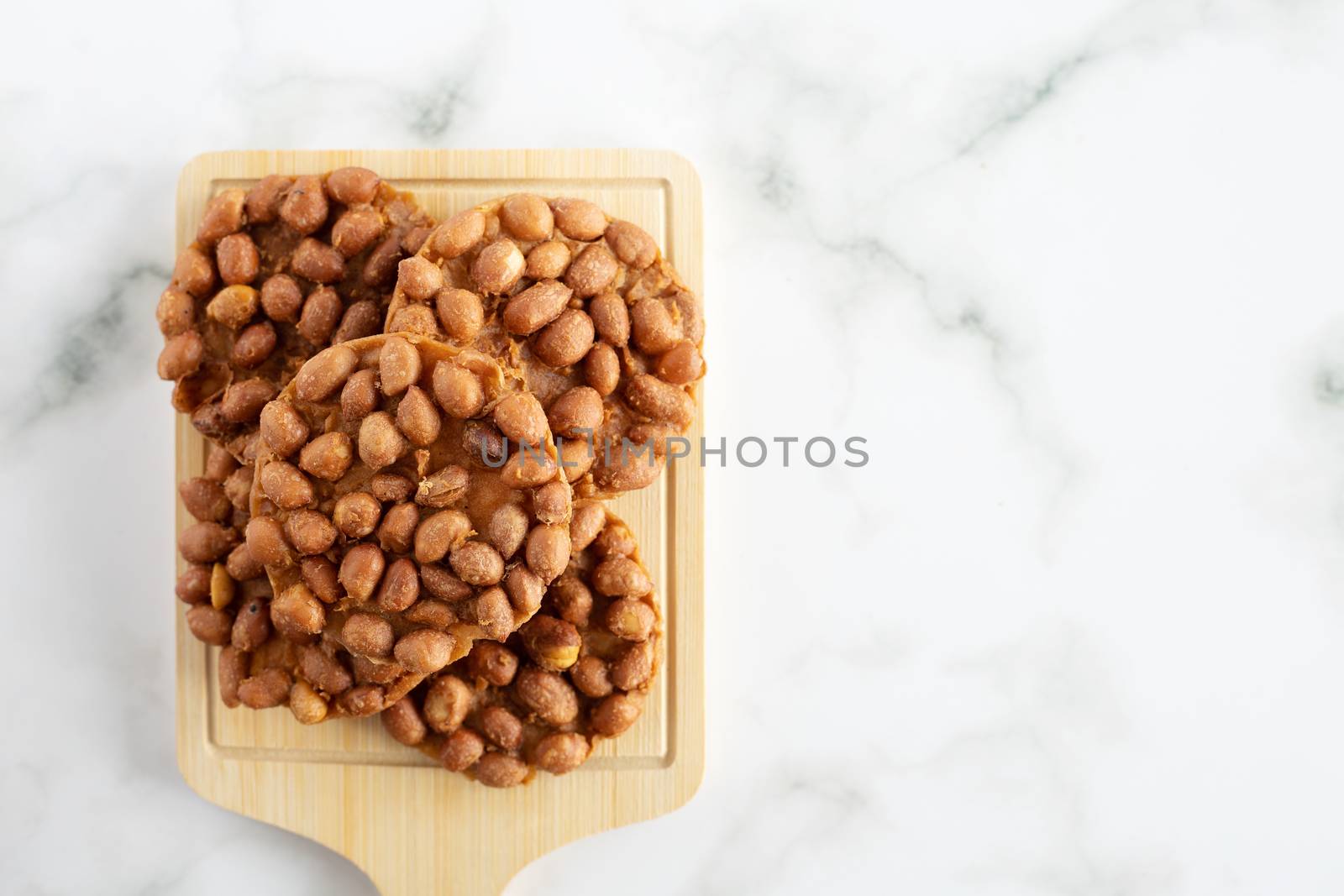 Thai fried peanut cookies for asian dessert, food and eating concept