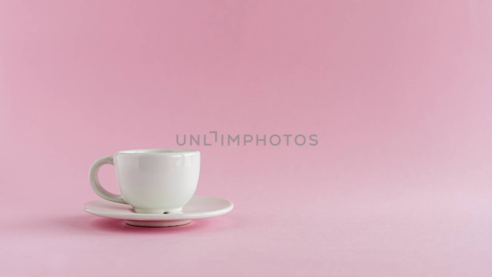White coffee cup on pink background for drinks, beverage, utensil and dishware concept
