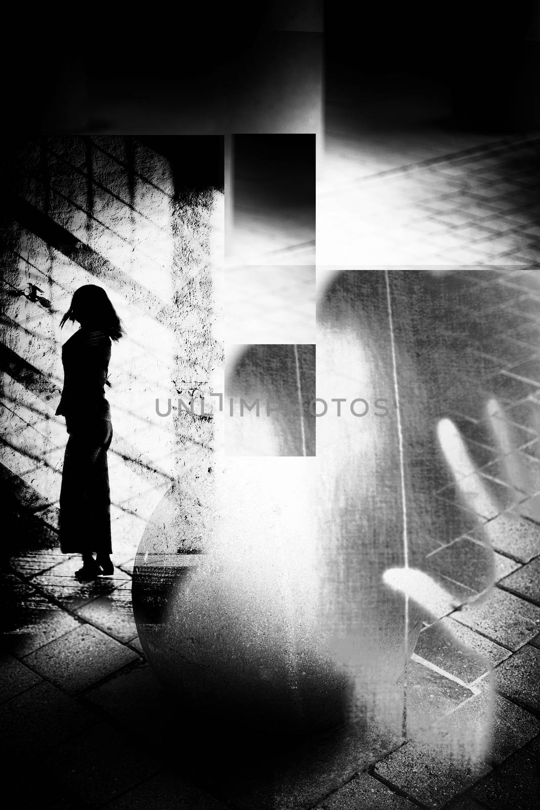 Artistic surreal black and white rough textured collage of silhouette of woman in urban environment.