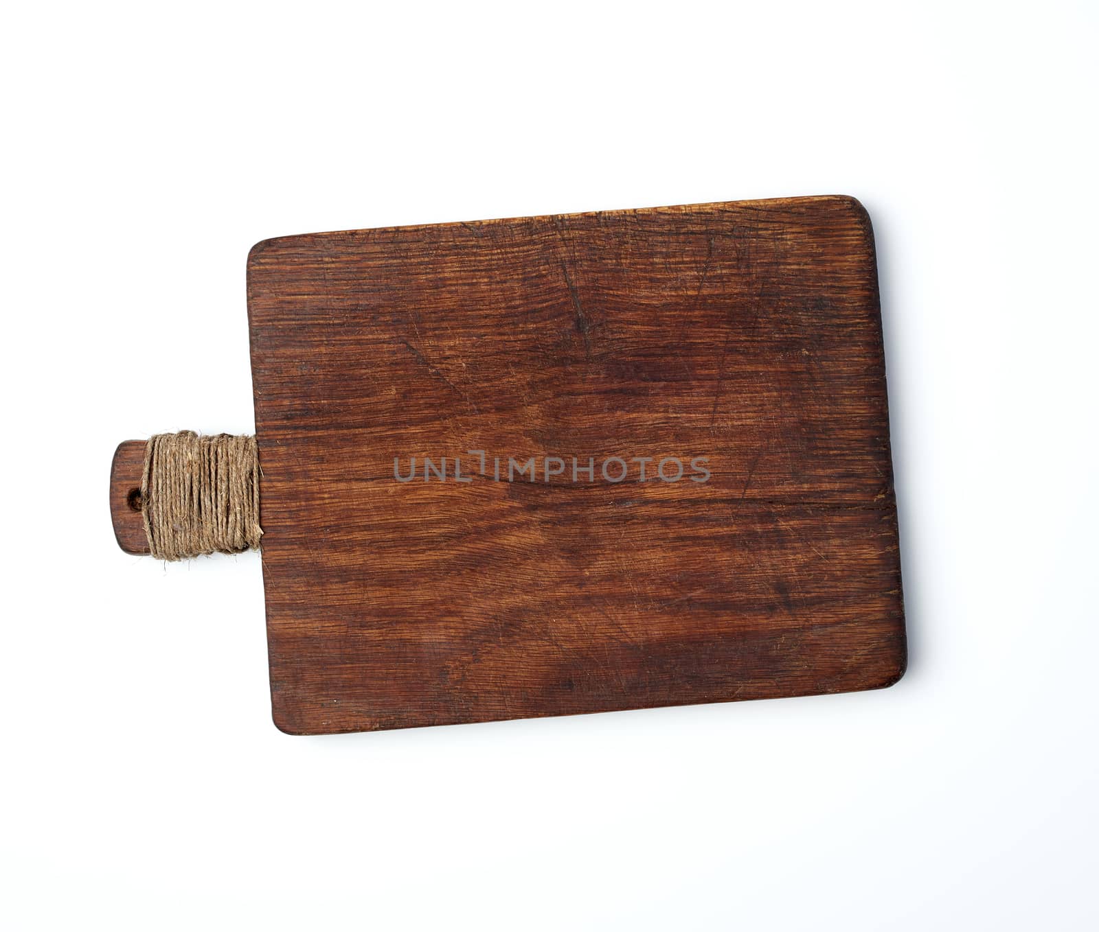 very old empty wooden rectangular cutting board, top view, white background