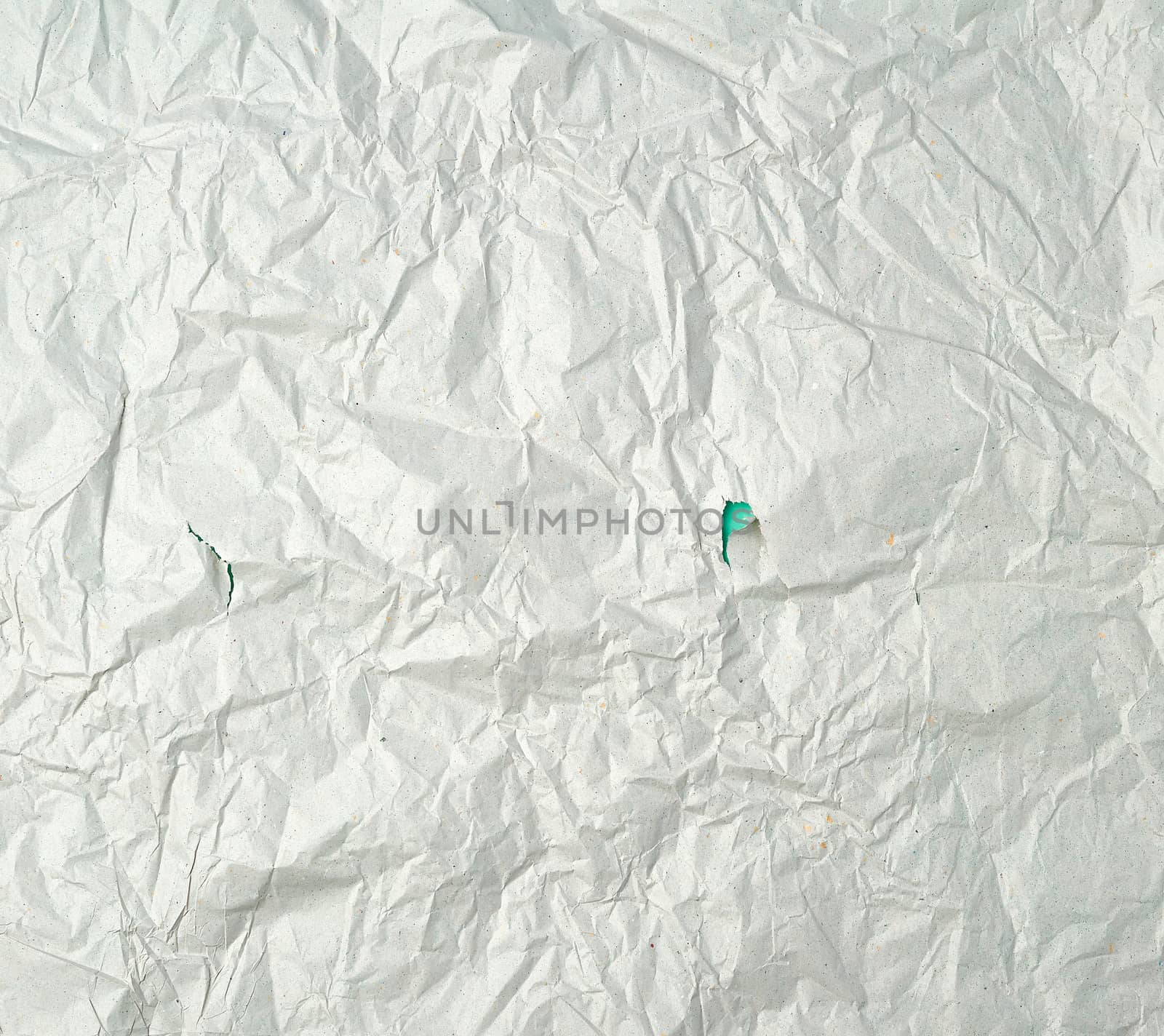 empty gray crumpled sheet of paper, full frame