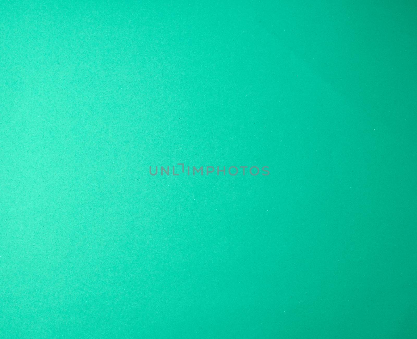 green paper background from thick paper, full frame, close up