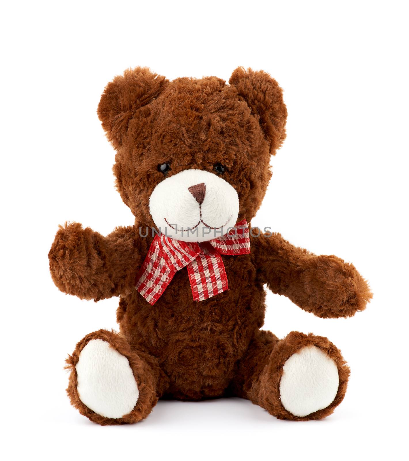 teddy bear with a red bow on his neck isolated on a white backgr by ndanko