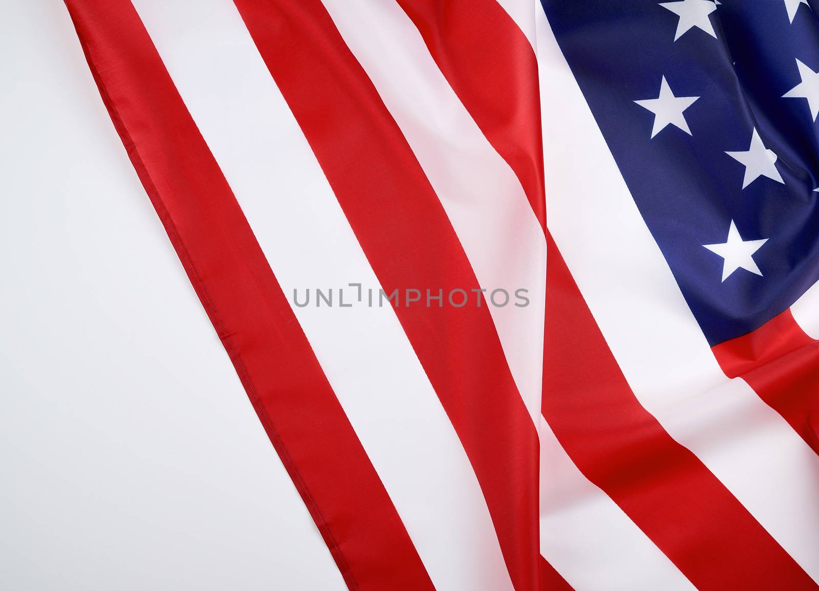 national textile flag of United States of America, surface in waves. Independence Day Background,  copy space