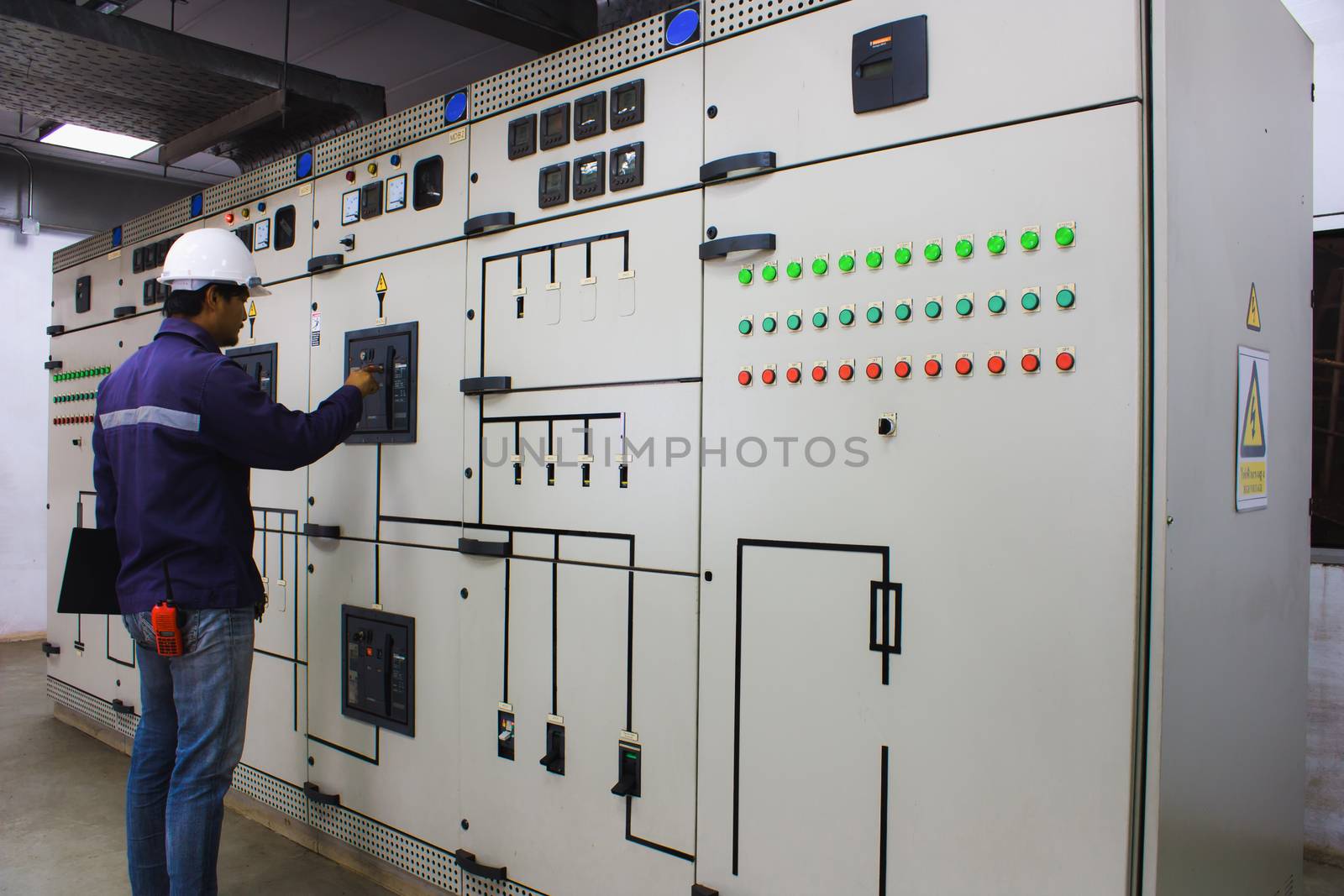 Engineer checking and monitoring the electrical system by iamnoonmai