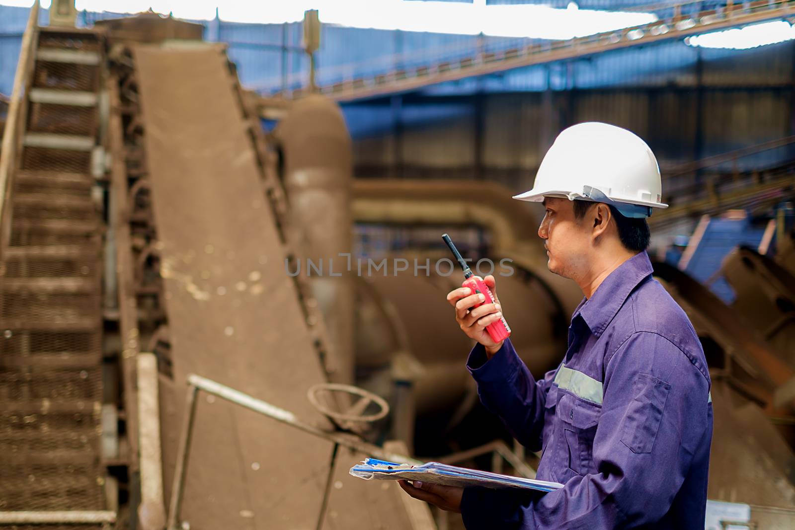 Engineer working in the production line process plant by iamnoonmai