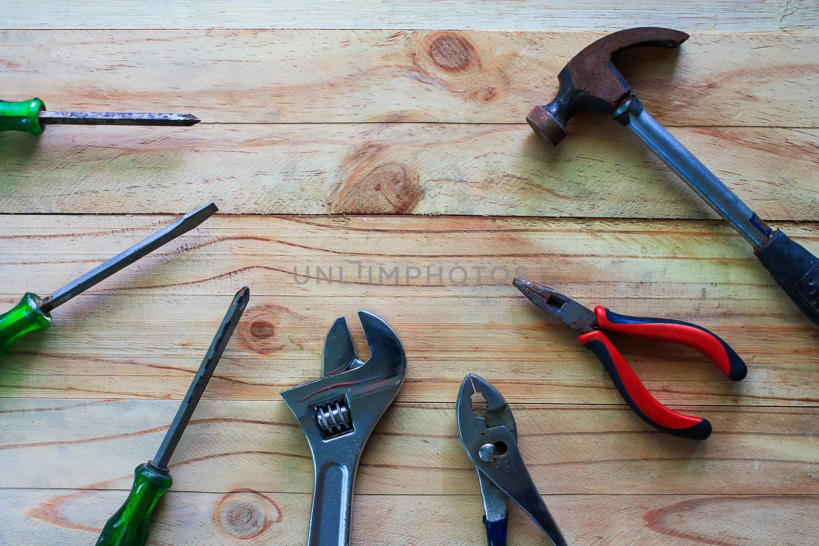 Old mechanical tool on the wood table
