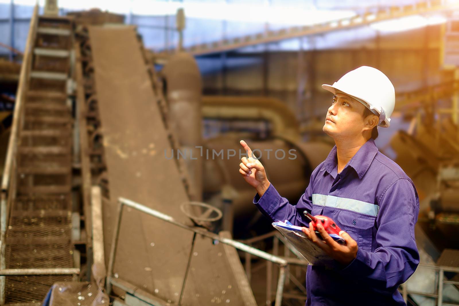 Engineer working in the production line process plant by iamnoonmai