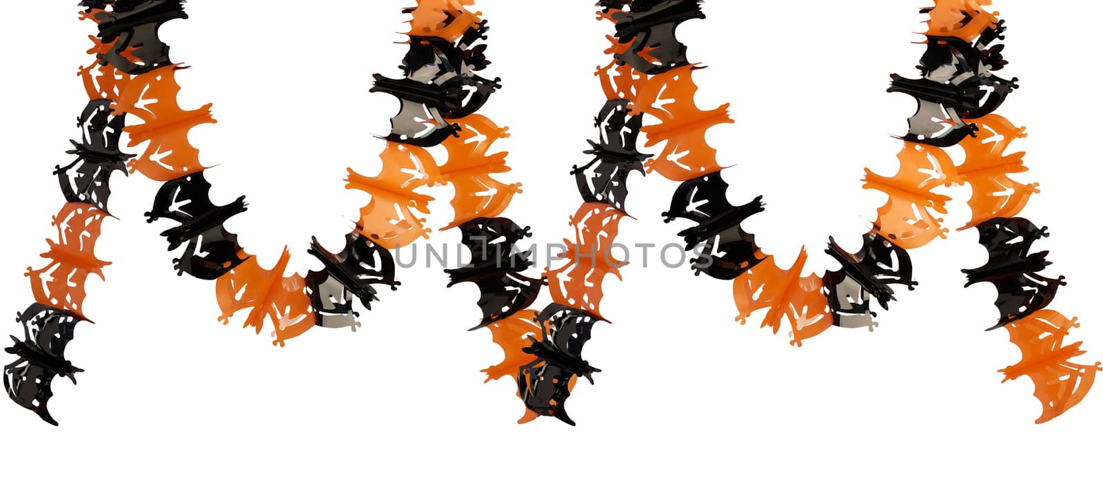 plastic garland on with bat figures cut out, the object is isolated on a white background, backdrop for Halloween