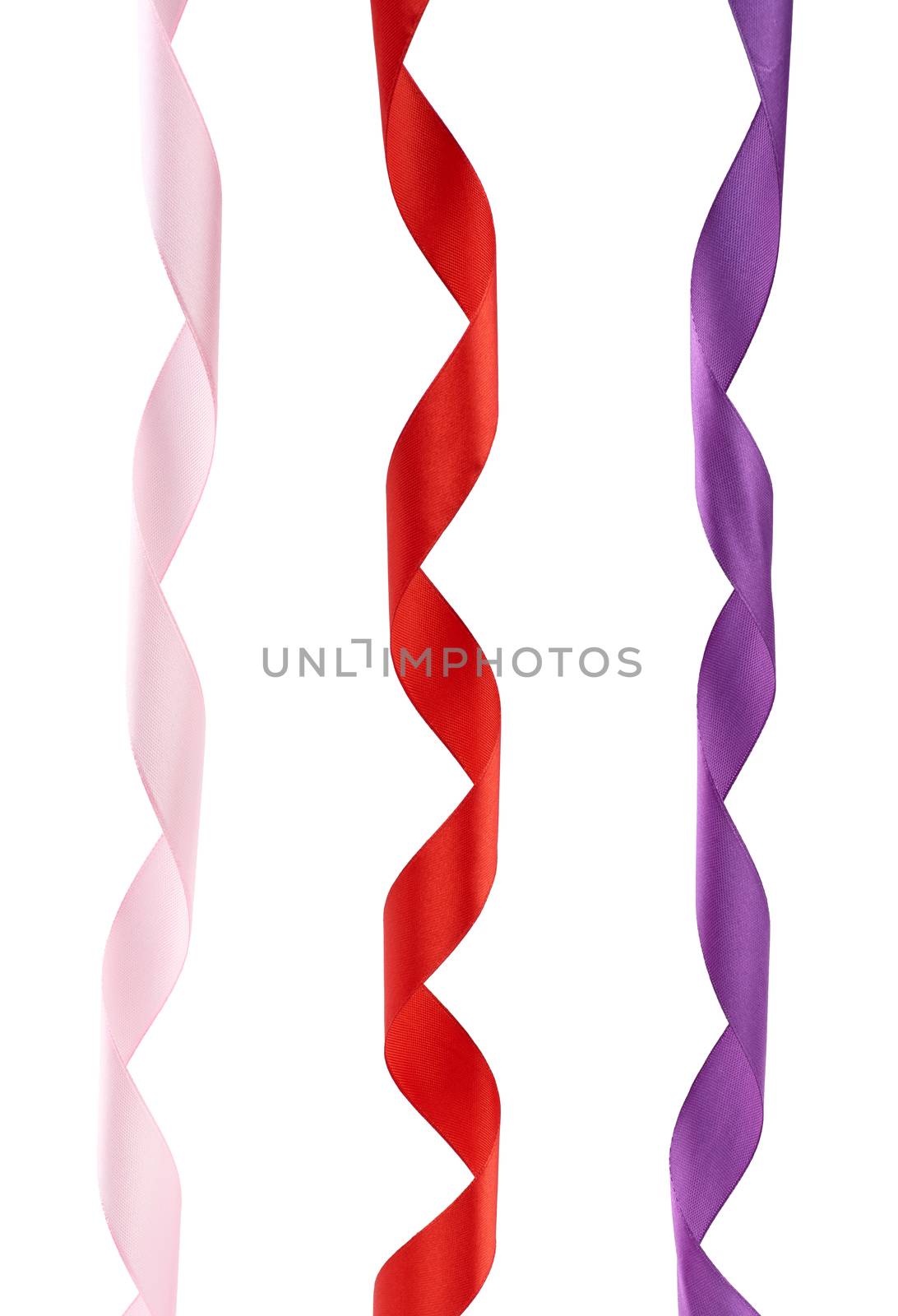 pink, red and purple satin twisted ribbons isolated on white background, close up