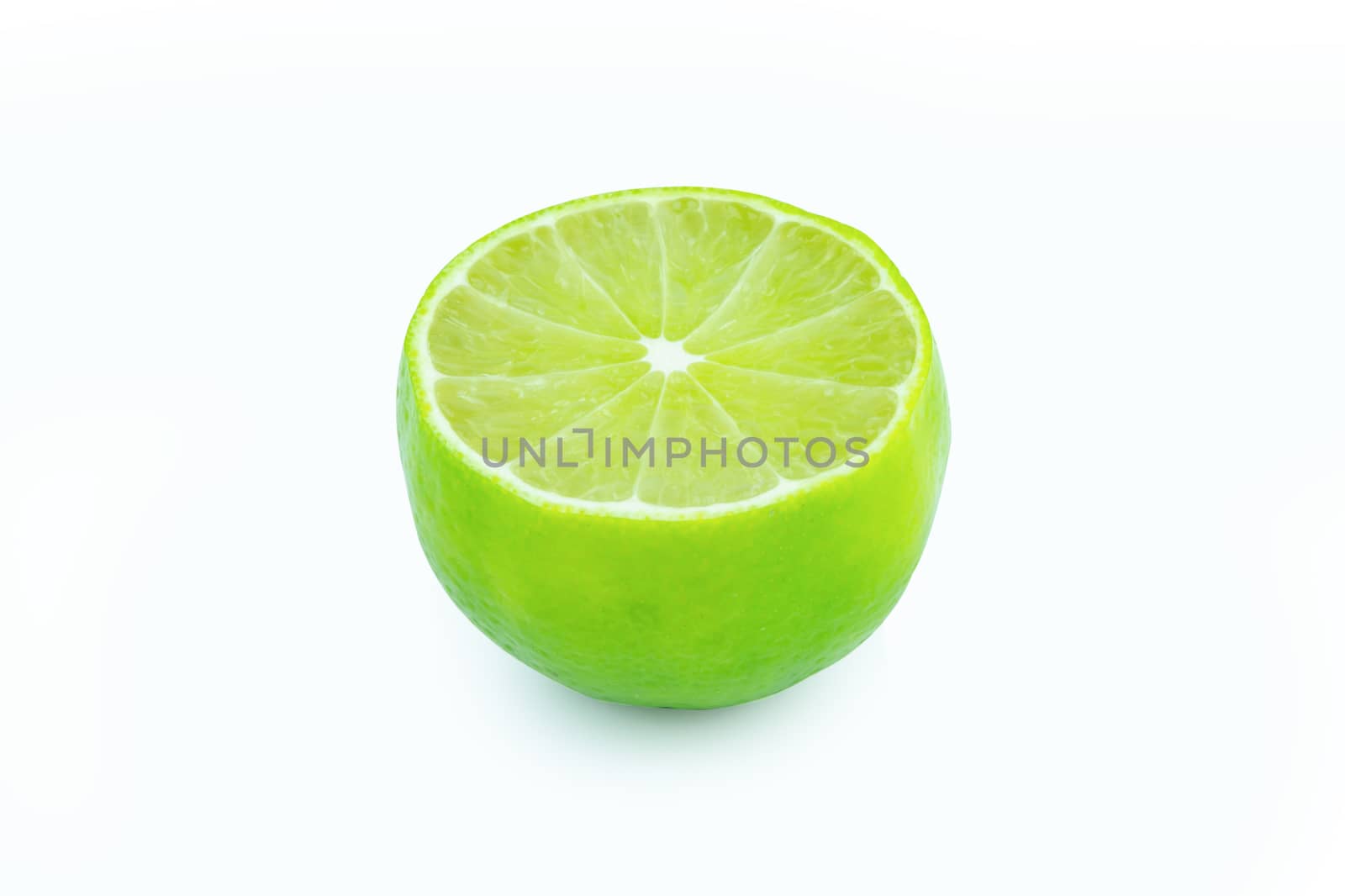 Lime with slices half isolated on white background. Green citrus fruit. with clipping path