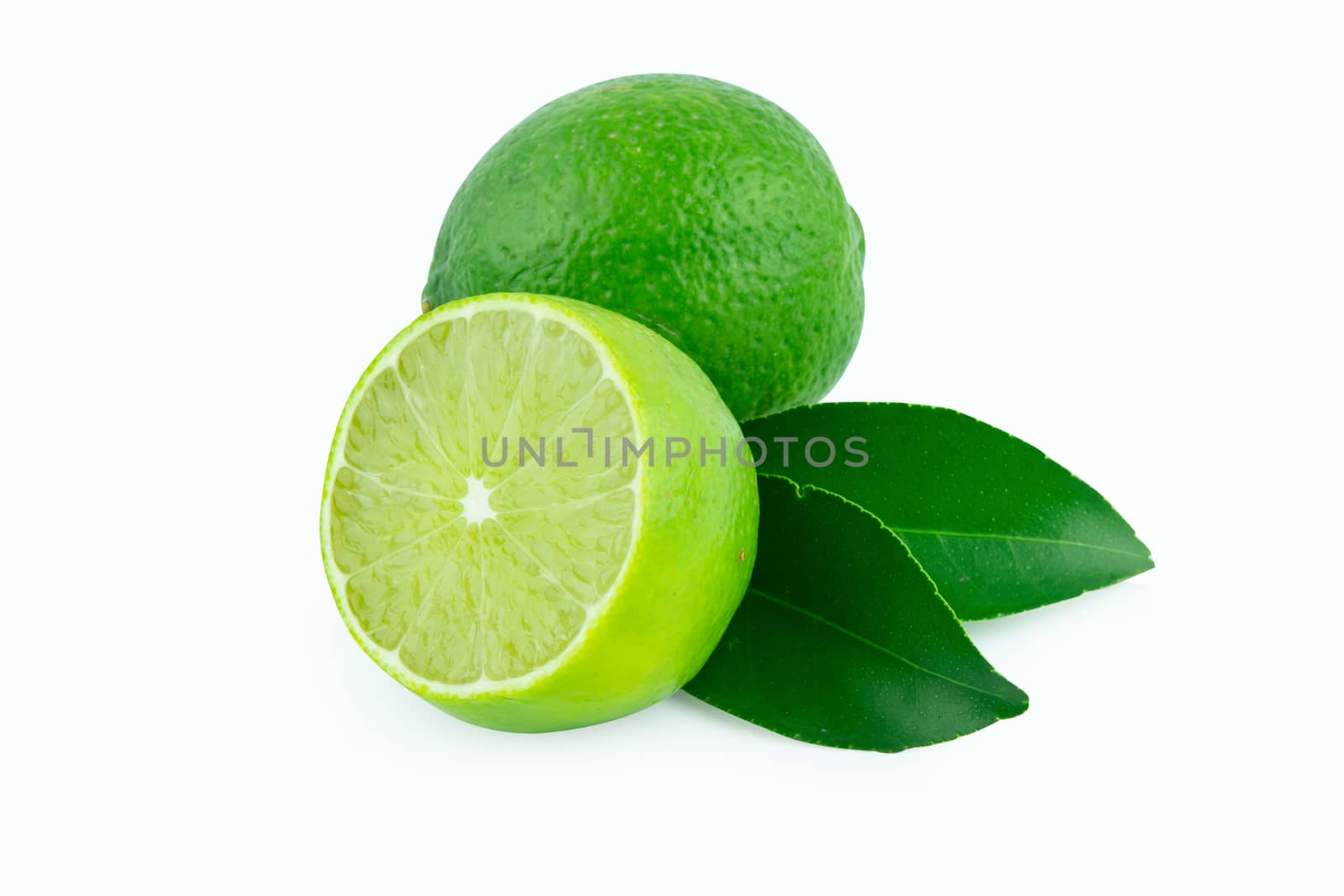 Lime with slices half and leaves isolated on white background. Green citrus fruit. with clipping path