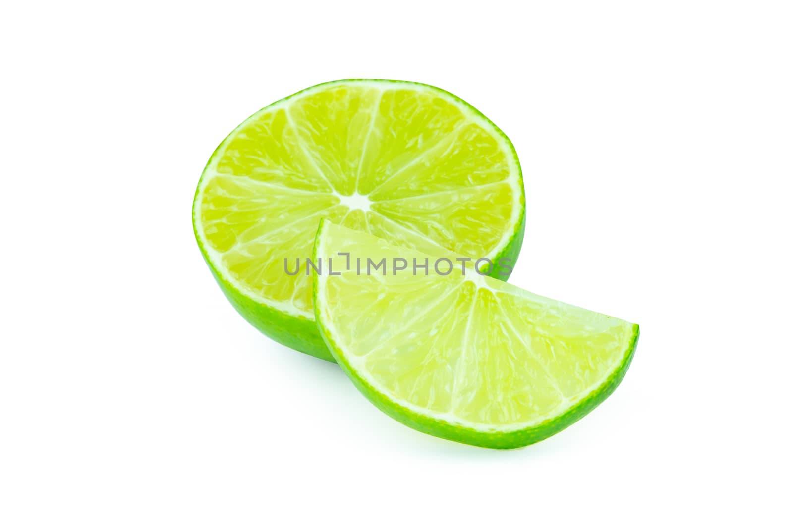 Lime with slices half isolated on white background. Green citrus fruit. with clipping path
