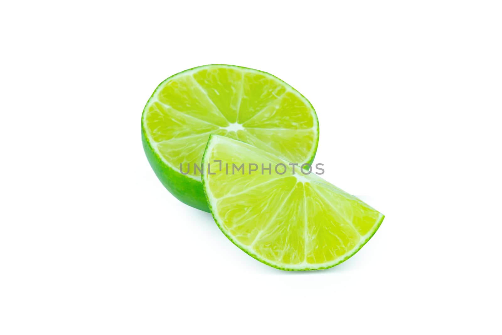 Lime with slices half isolated on white background. Green citrus fruit. with clipping path