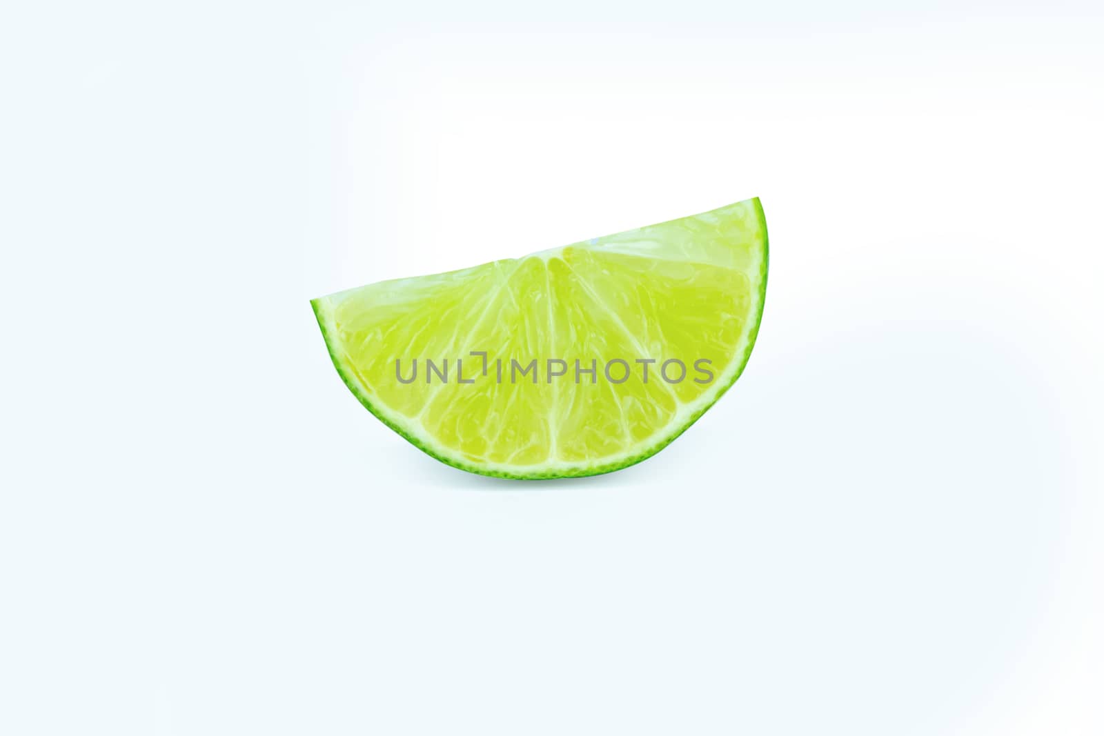 Lime with slices half isolated on white background. Green citrus fruit. with clipping path
