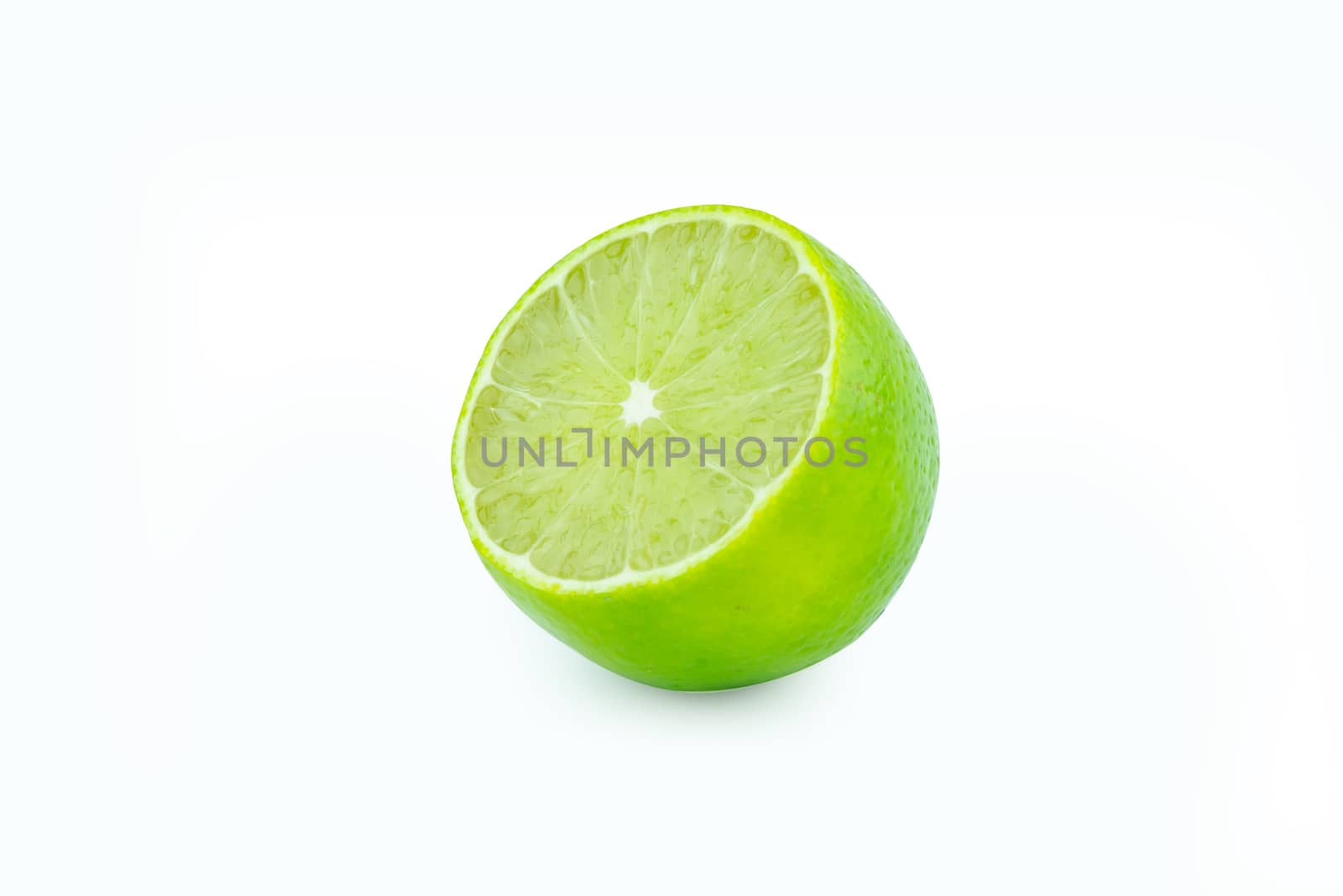 Lime with slices half isolated on white background. Green citrus fruit. with clipping path