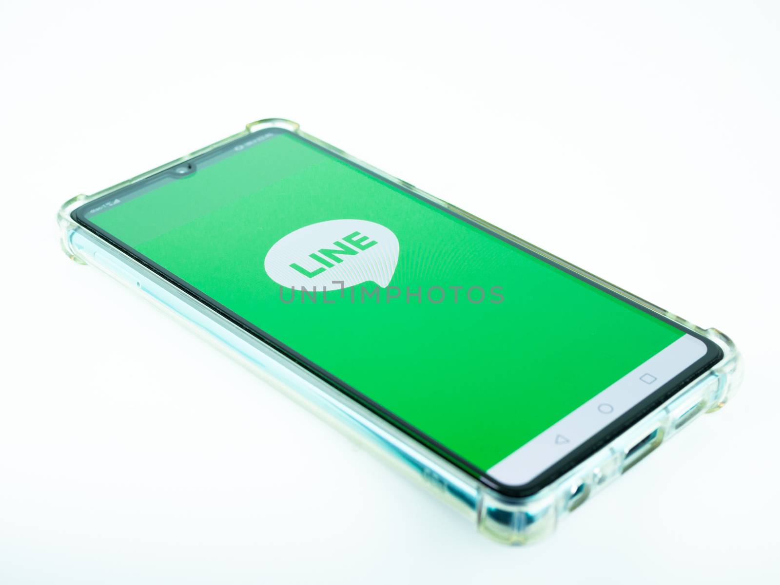 BANGKOK ,THAILAND - MARCH 21, 2020 : LINE application Logo on Huawei P30 Smartphone Display, Is a Most famous Messenger.
