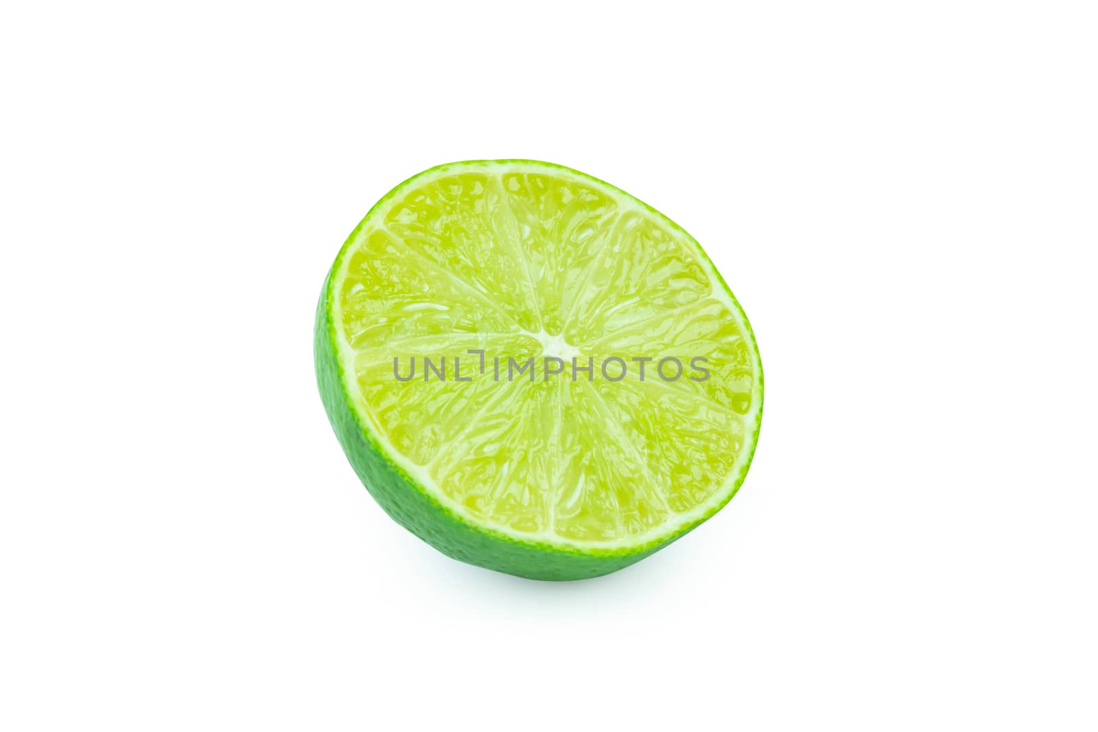 Lime with slices half isolated on white background. Green citrus fruit. with clipping path