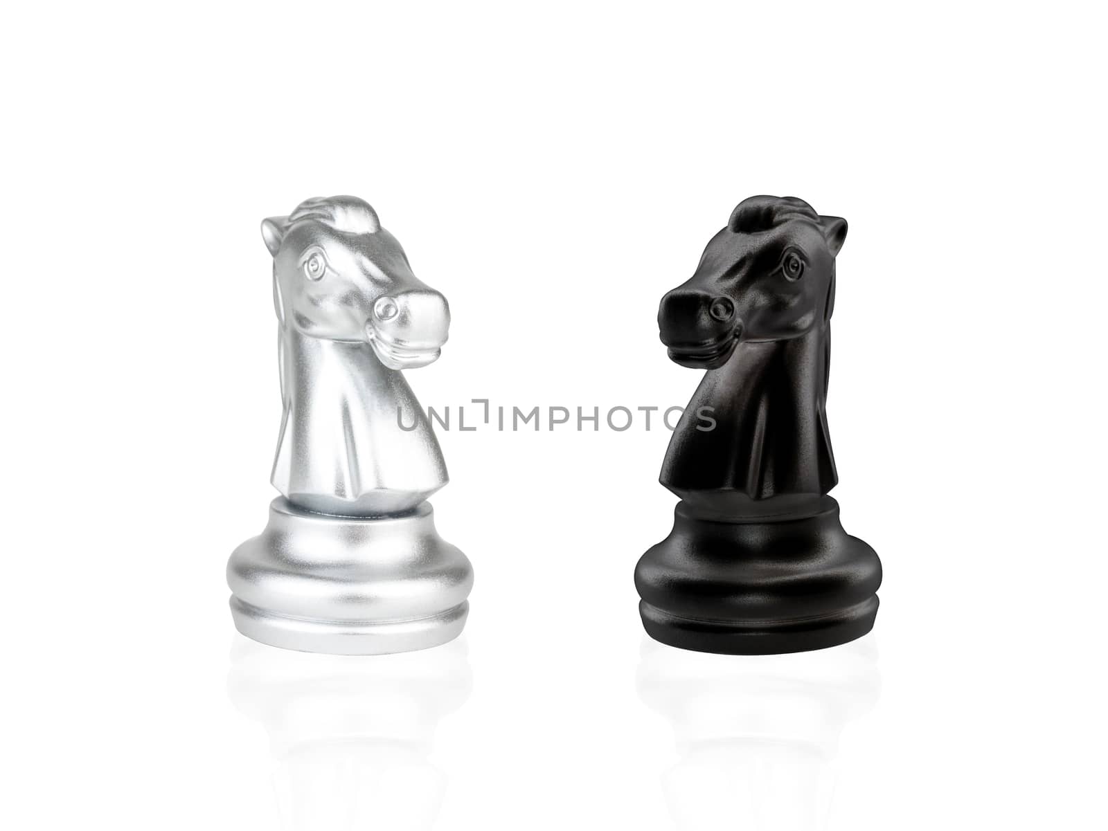 The Knight Chess pieces battle, black and silver isolated on white background