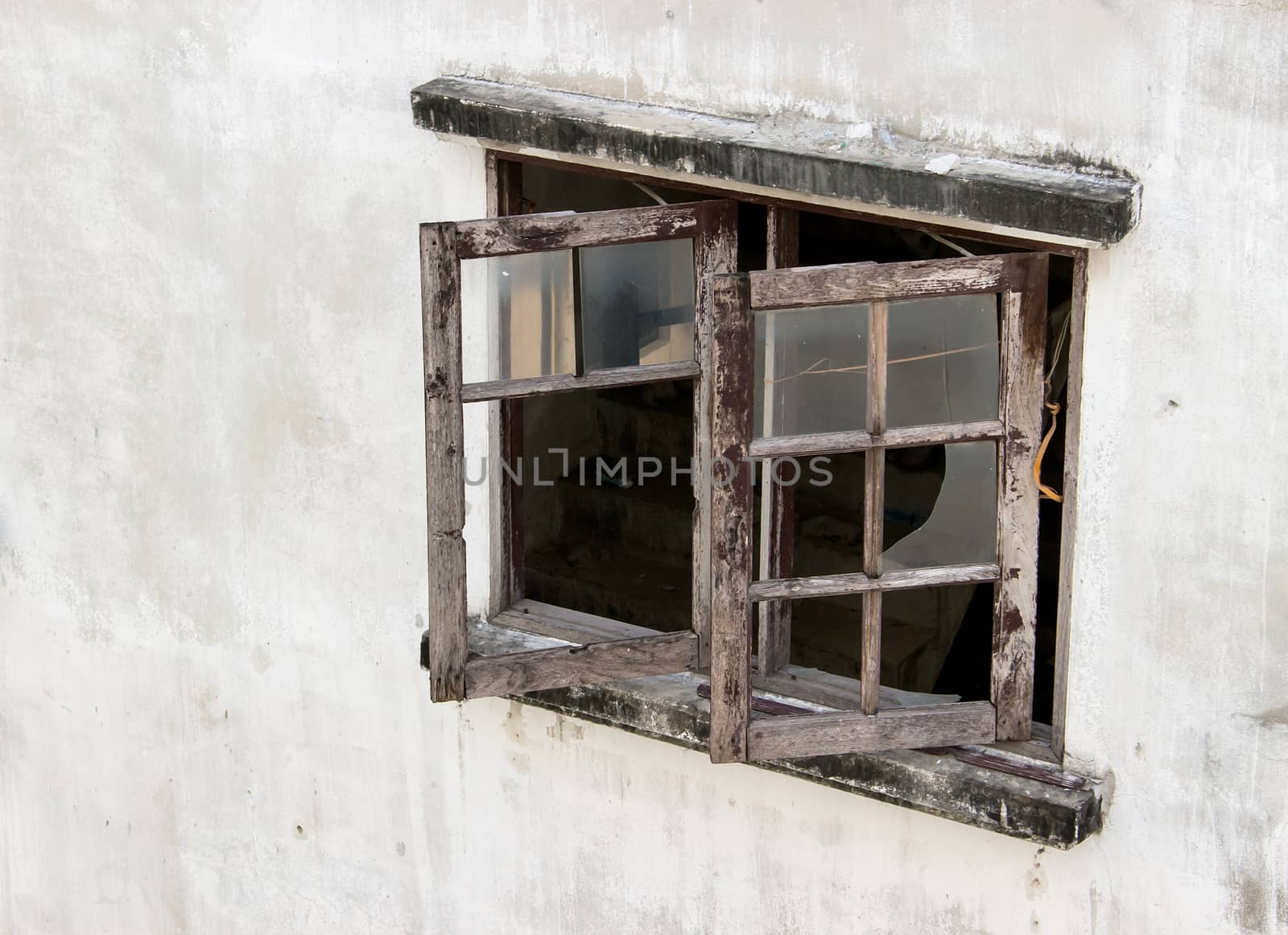 Old Windows were left to decay by Theeraphon