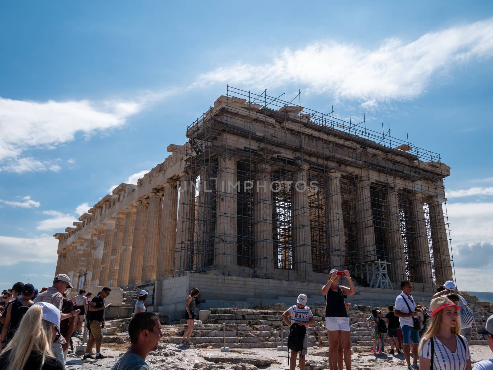 ATHENS, GREECE JULY. 30, 2019 The Acropolis of Athens is always crowded - this is the most visited monument of antiquity in Greece.