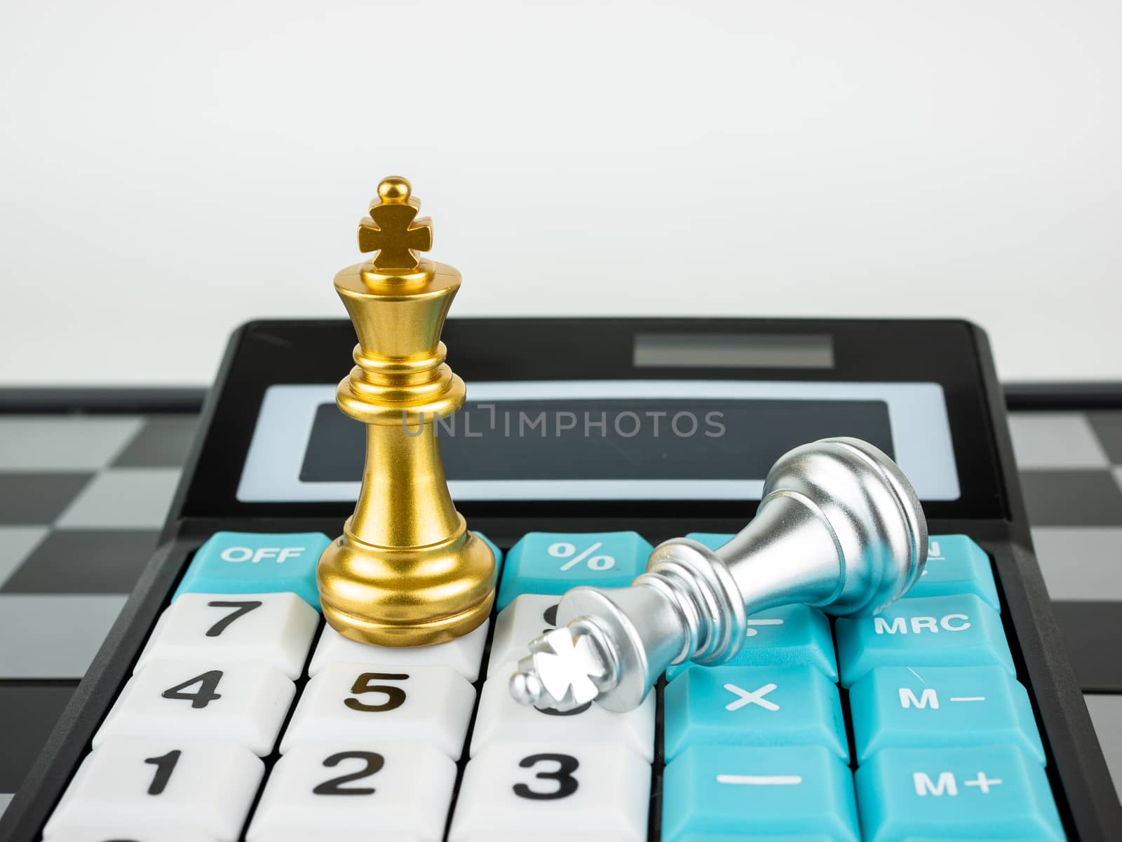 Financial games concept, Game of chess with calculator, selectiv by Amankris