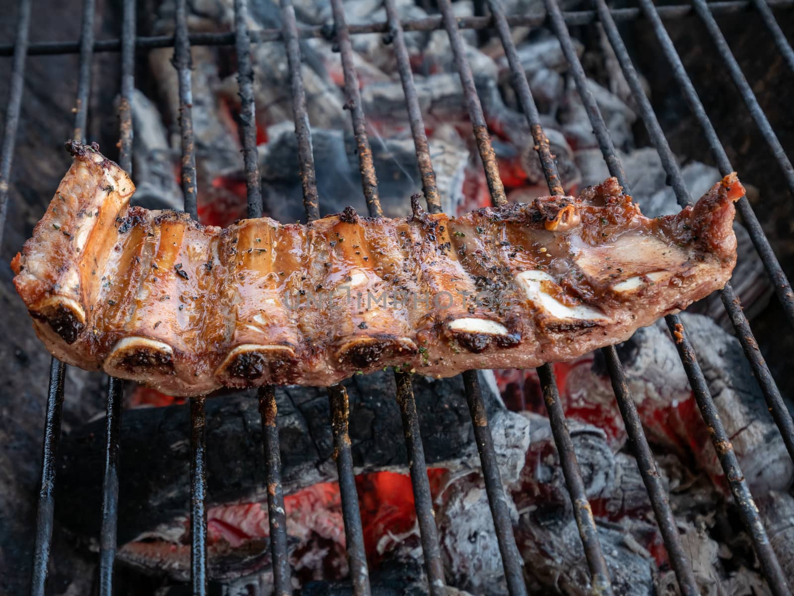 T-Bone Steak on Barbecue Grill. by Amankris