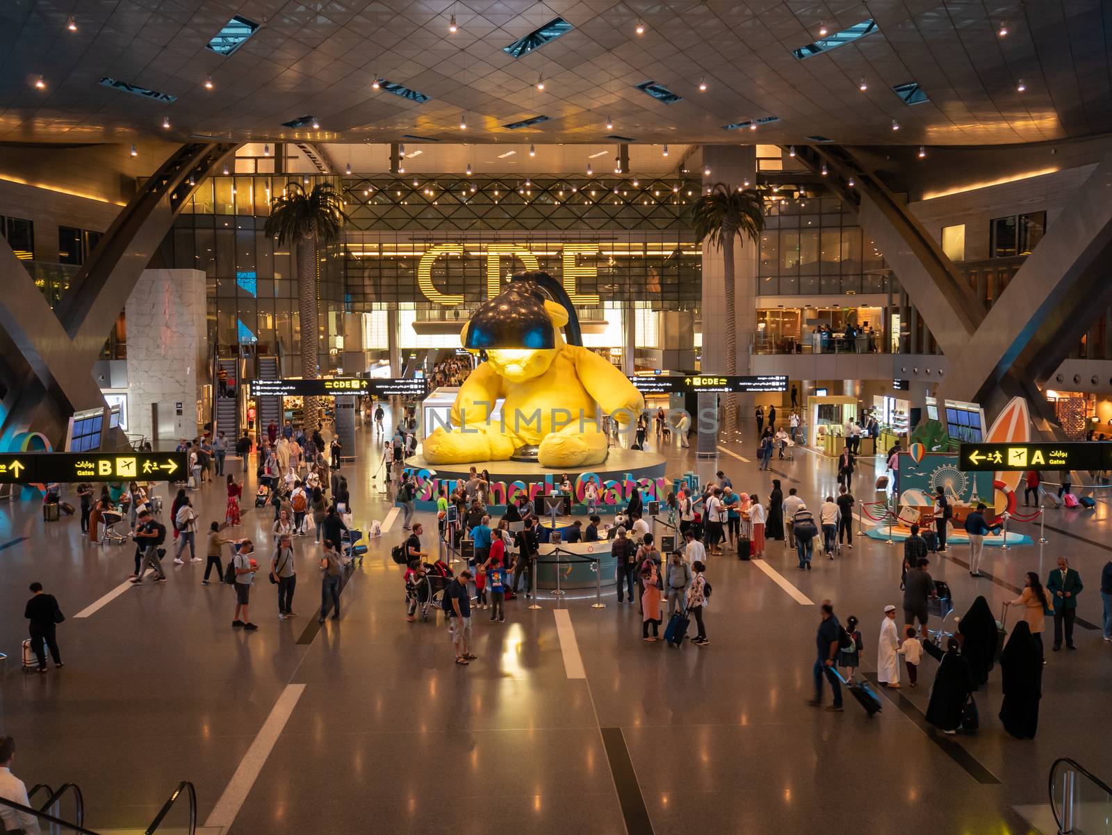 DOHA, QATAR - MAY. 31, 2019: Yellow Lamp bear at Hamad International Airport.