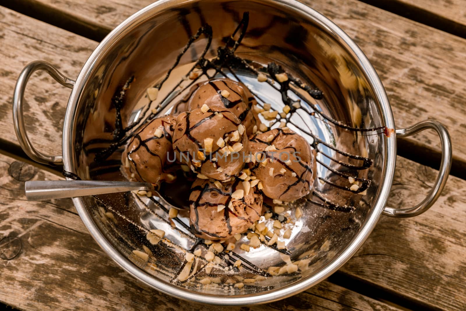 Chocolate ice cream in a silver bowl by camerarules