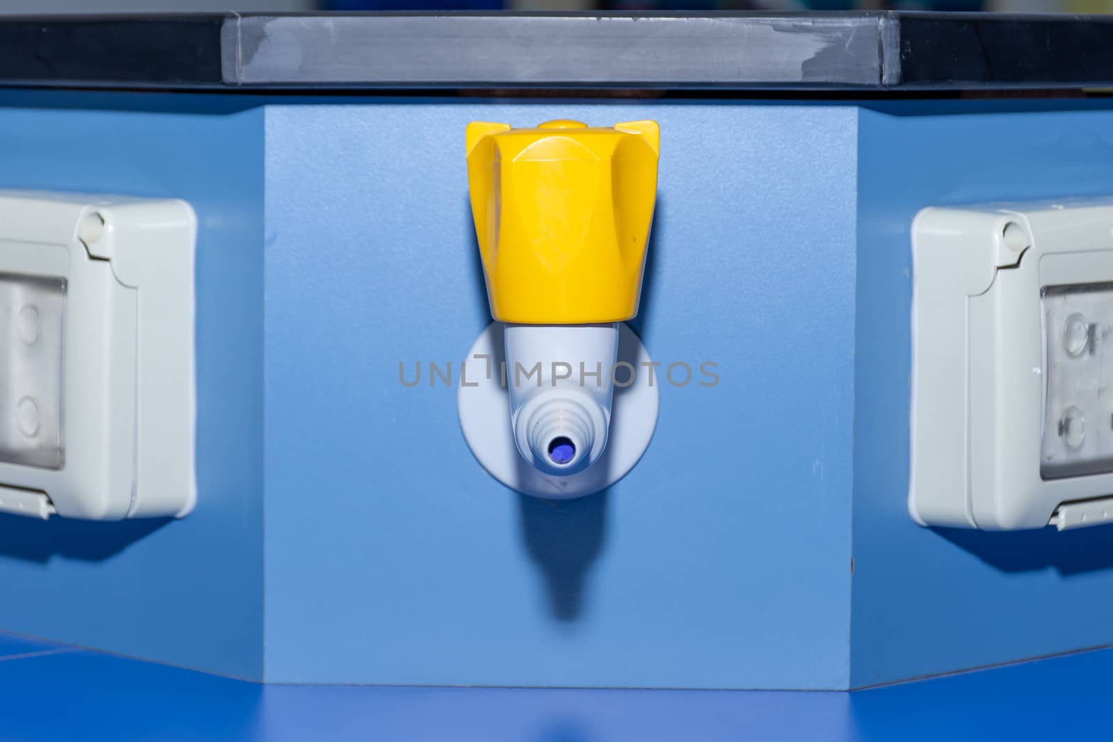 Science laboratory gas nozzle on a blue empty school lab table i by kingmaphotos