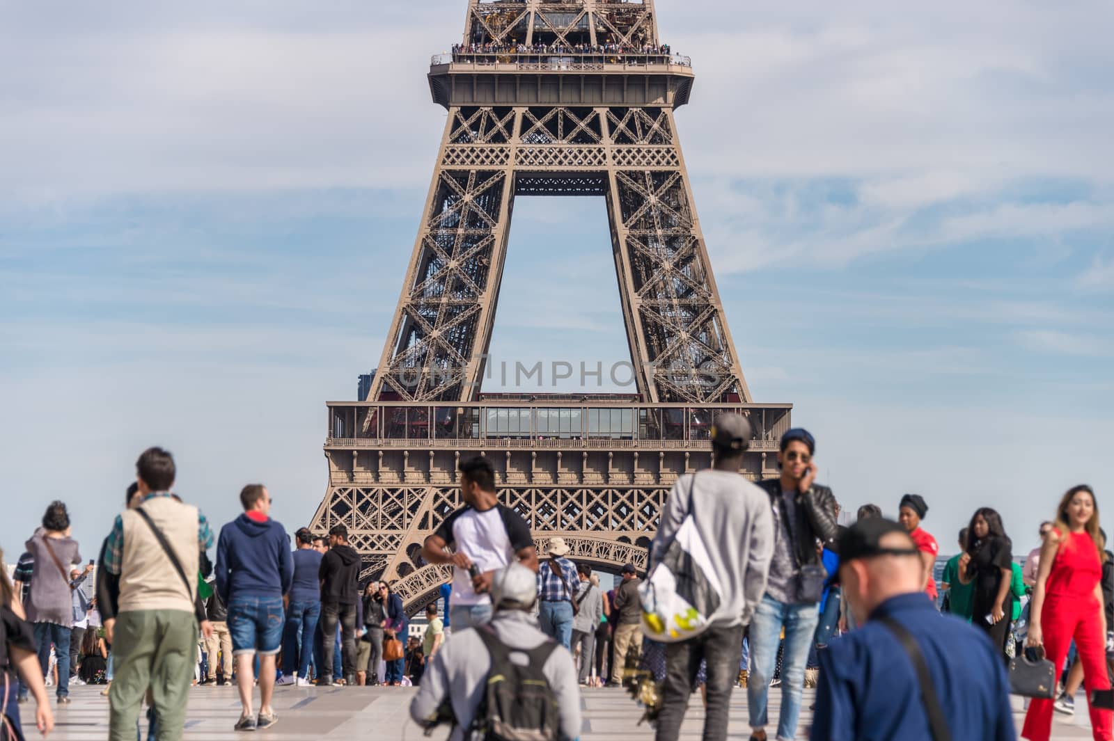 Eiffel Tower from Trocadero with many tourists in the foreground by mbruxelle