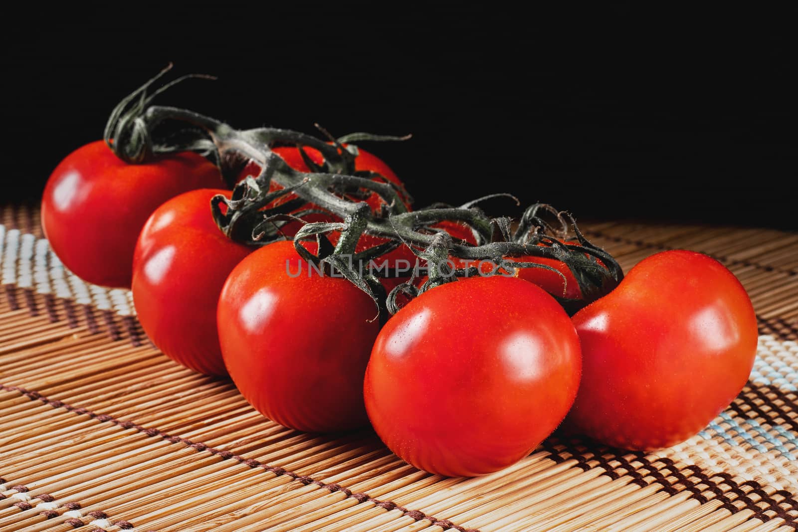 tomatoes on a wooden coaster by 84kamila