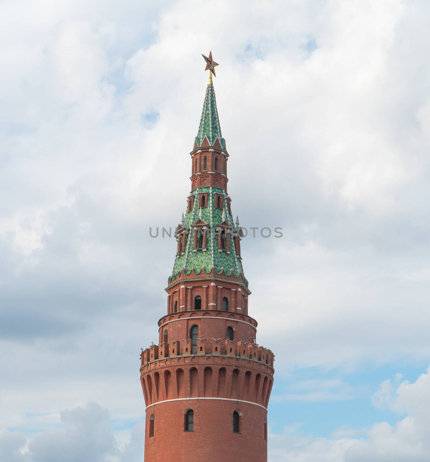 Russian Kremlin tower with a star against the sky