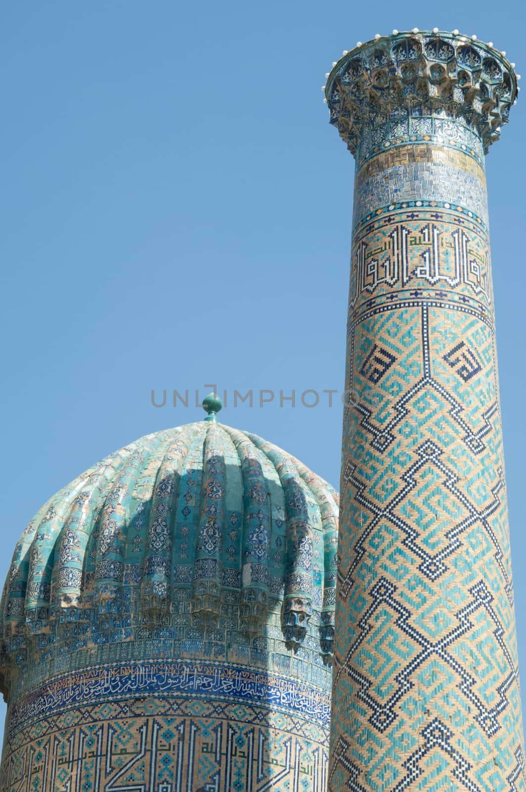 Domes and towers of Registan in Samarkand. Ancient architecture of Central Asia