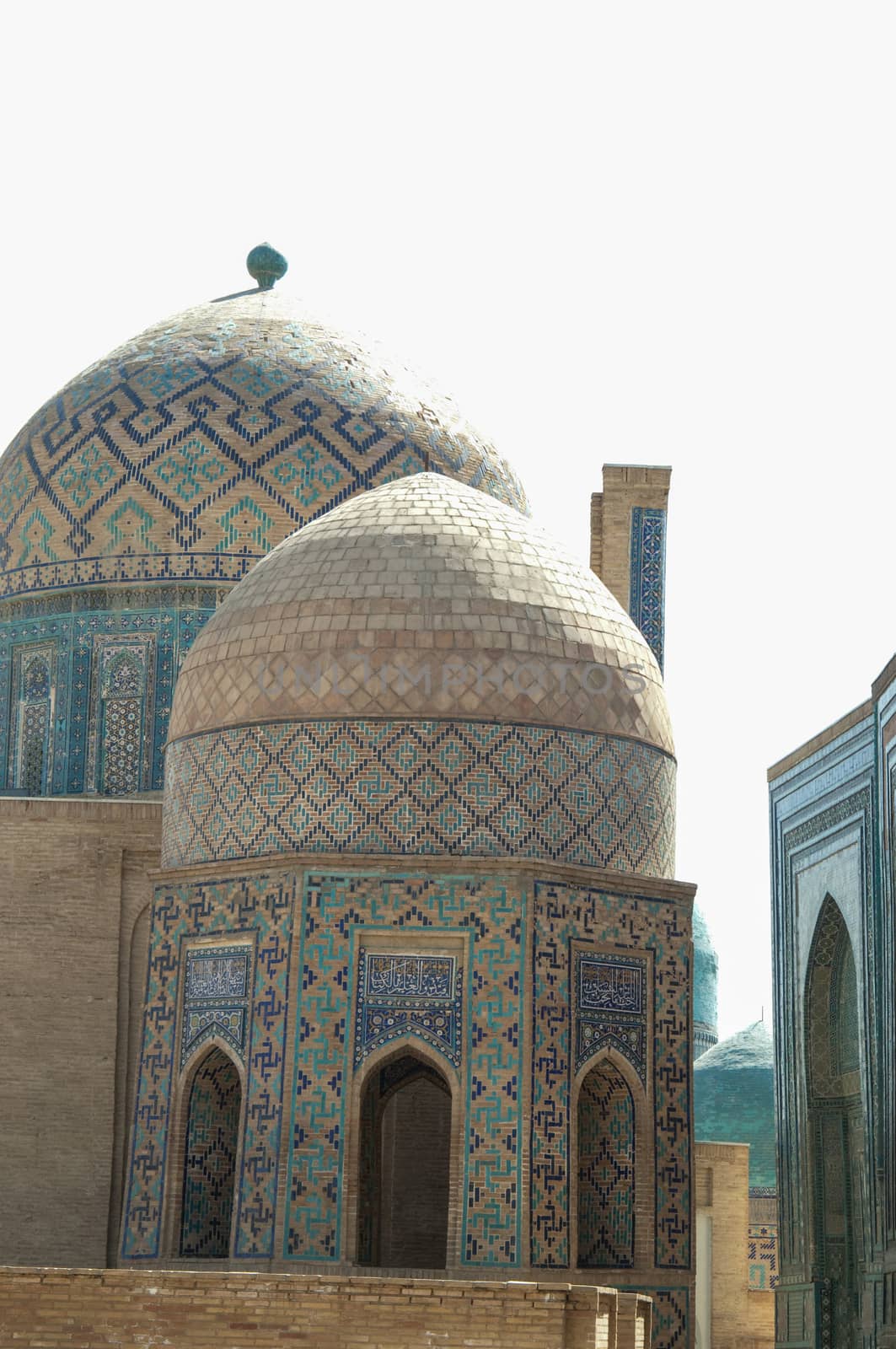 Domes and towers of Registan in Samarkand. Ancient architecture of Central Asia