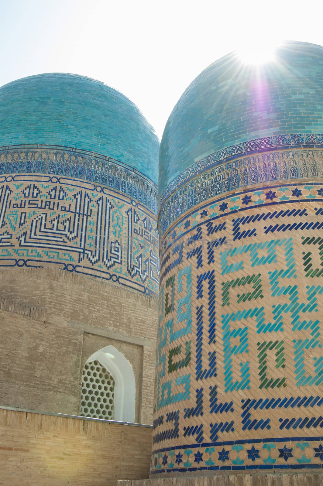 Domes and towers of Registan in Samarkand. Ancient architecture of Central Asia