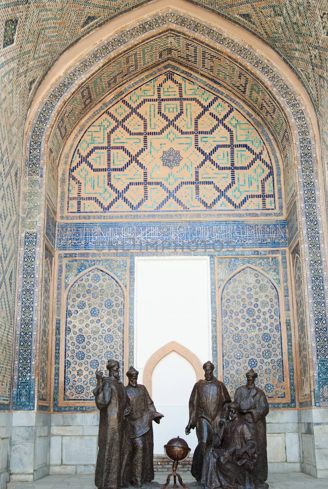 Monument of Mirzo Ulugbek with astronomers in the Registan. Ancient architecture of Central Asia. Ancient architecture of Central Asia