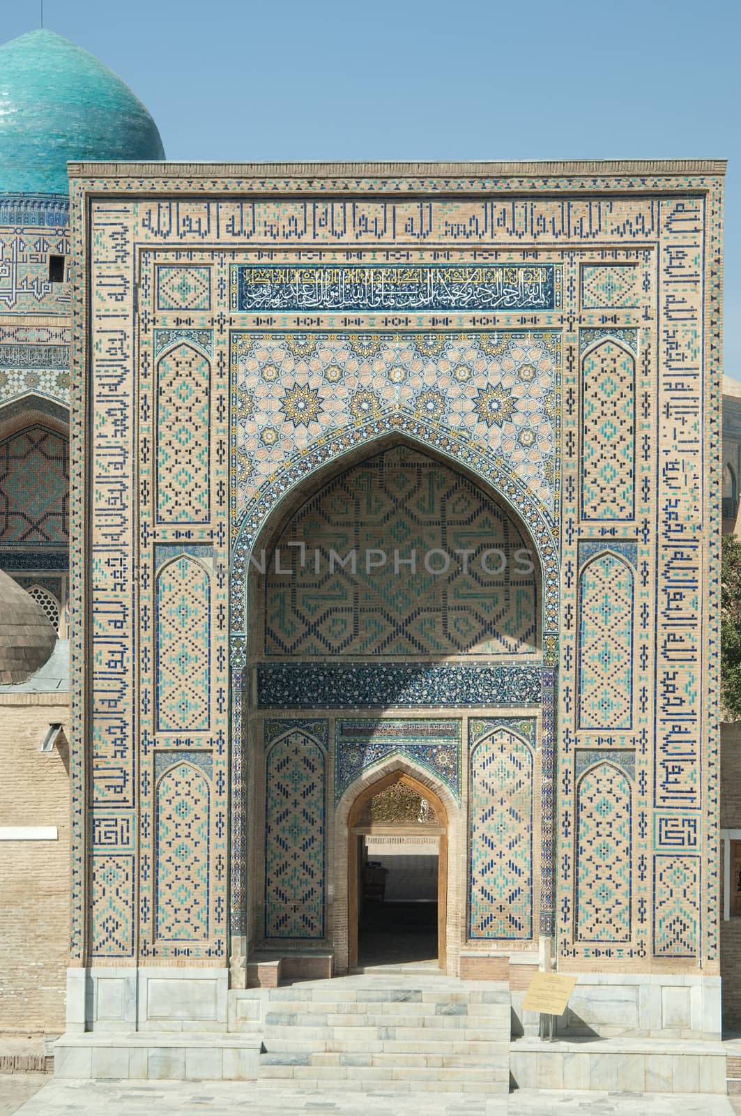 The arch and the exterior design of the ancient Registan in Samarkand. Ancient architecture of Central Asia