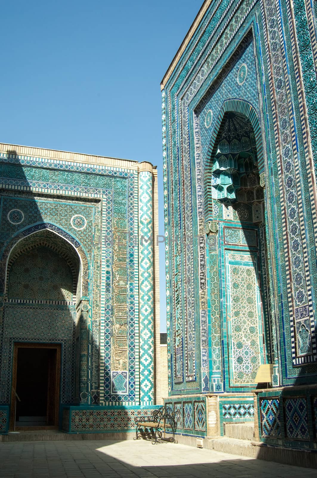 The arch and the exterior design of the ancient Registan in Samarkand. Ancient architecture of Central Asia
