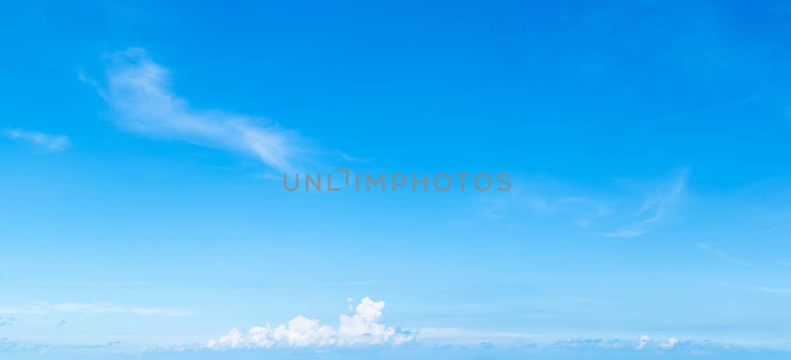 Soft white clouds against blue sky ,Panoramic fluffy clouds in the blue sky