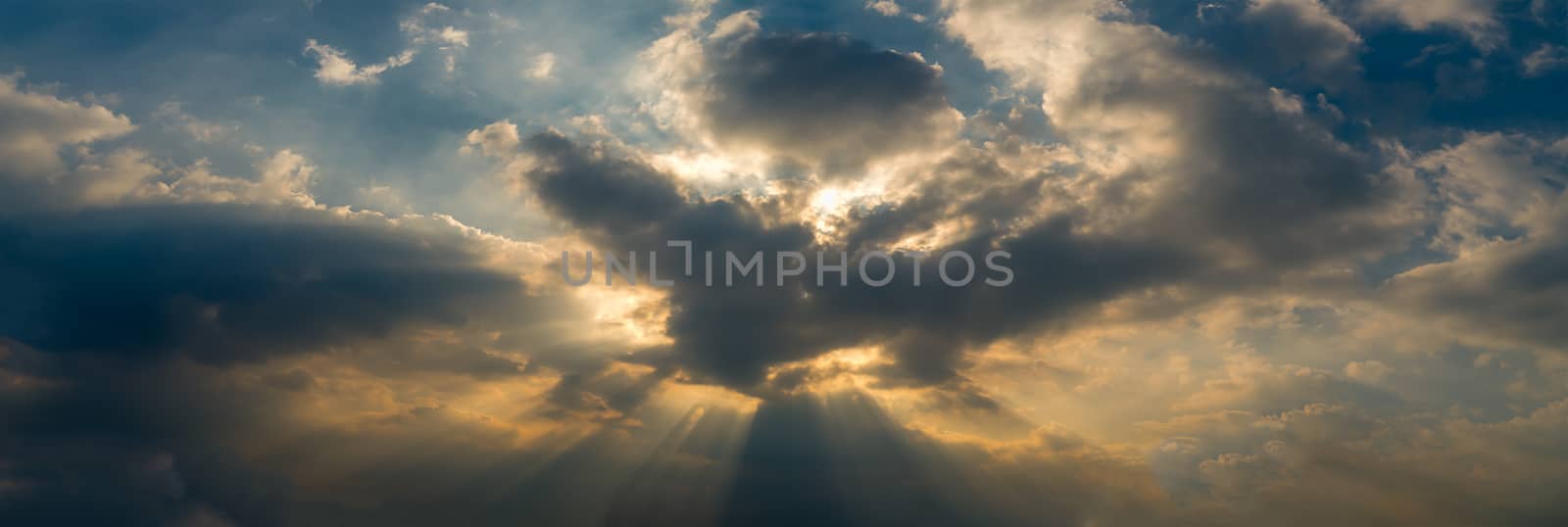 Panoramic sunset with fluffy clouds in the twilight sky,Sunlight with dramatic cloud