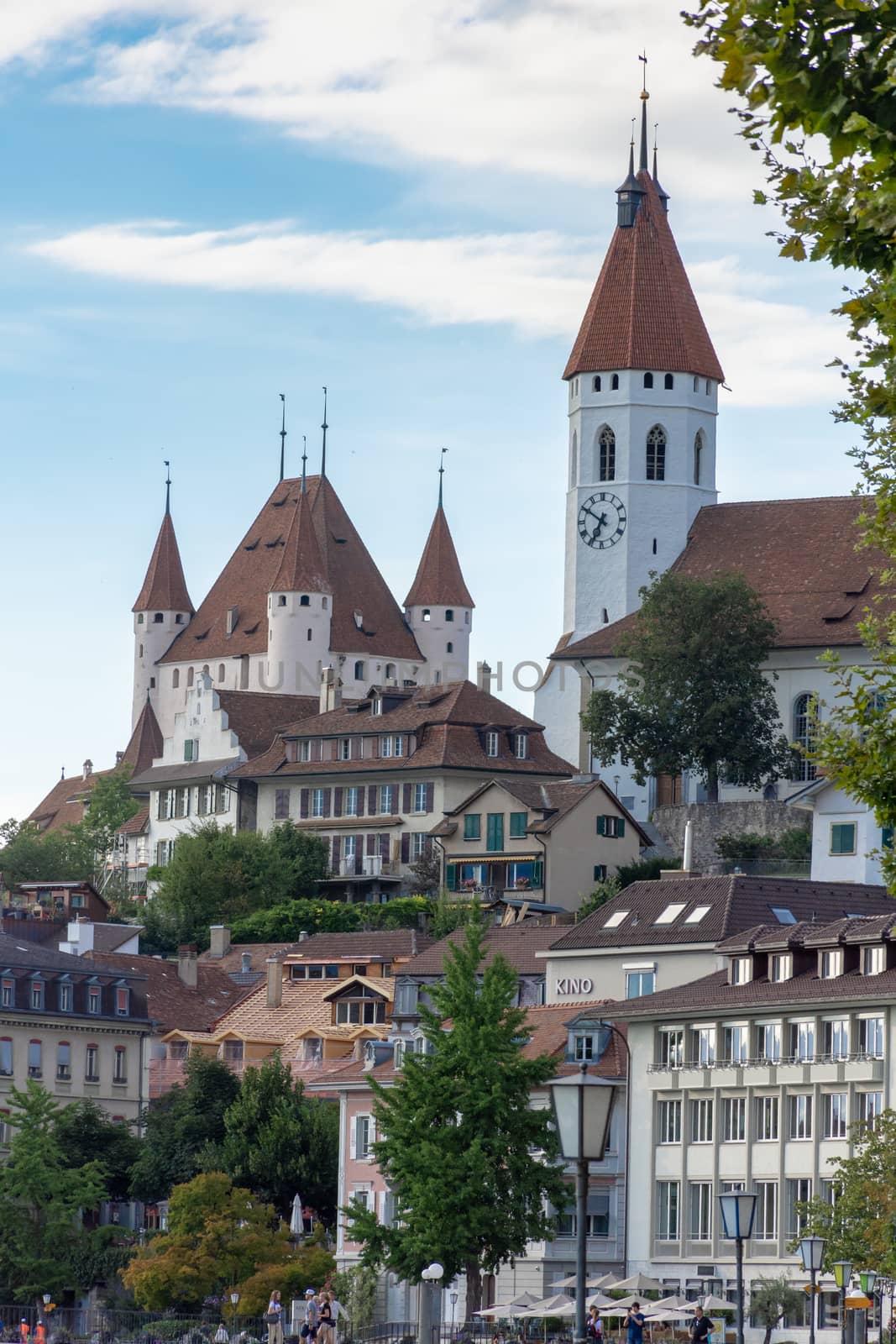 "Thun, Oberland/Switzerland - 8/10/2018: Downtown Thun, Oberland, Switzerland. Castle (Schloss Thun) view into a blue sky day.."