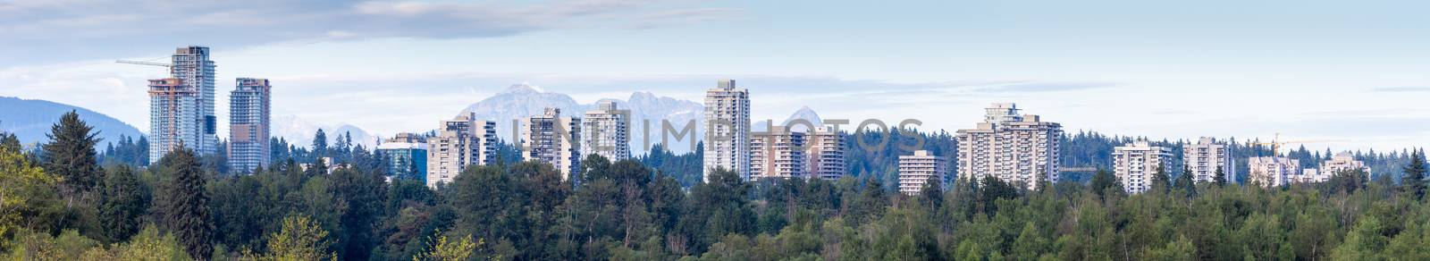 Panorama of the Burnaby, British Columbia, Canada apartment development skyline looking towards the Burnaby and Maple Ridge Mountains.