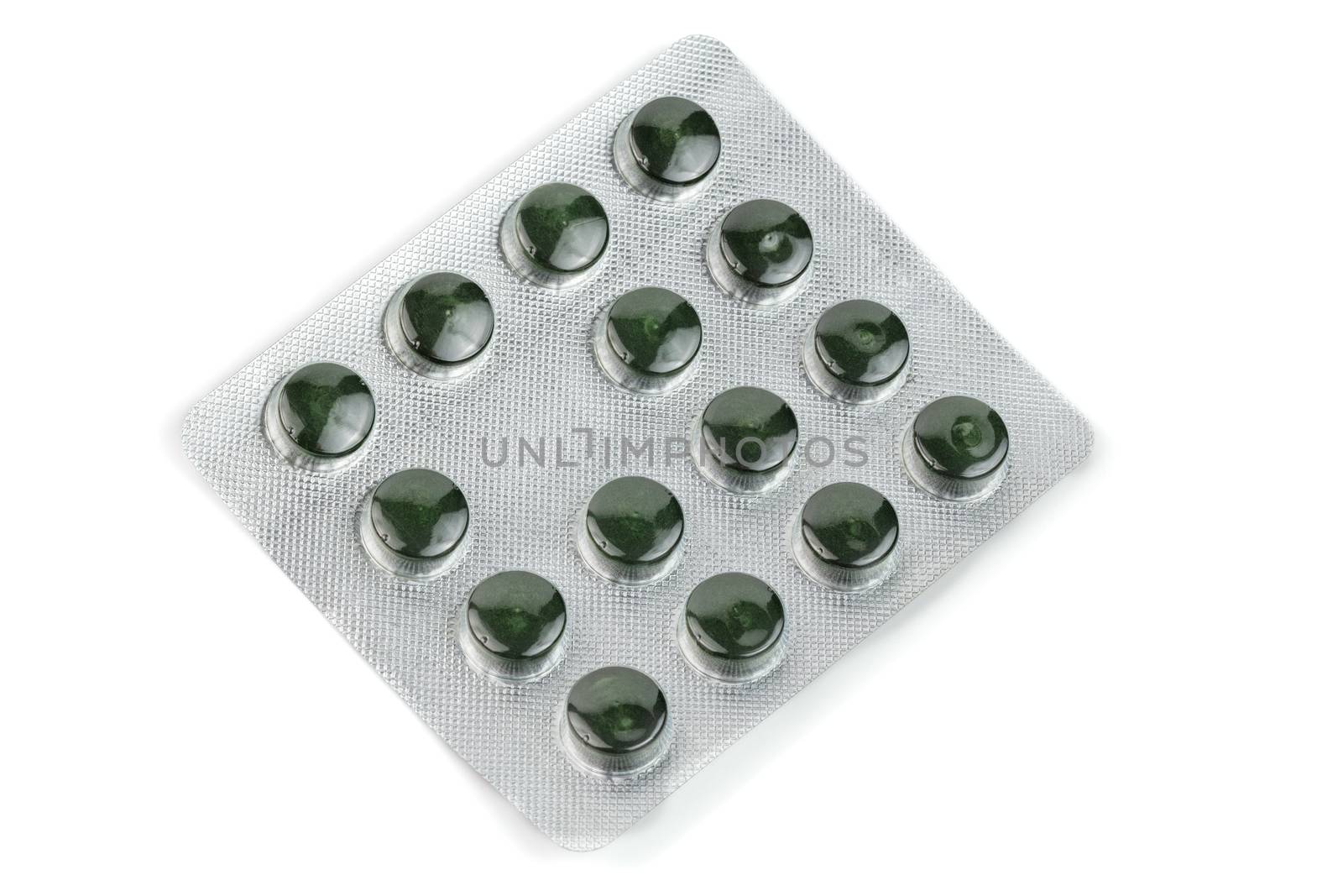 blister pack of green spirulina pills isolated on white background by z1b