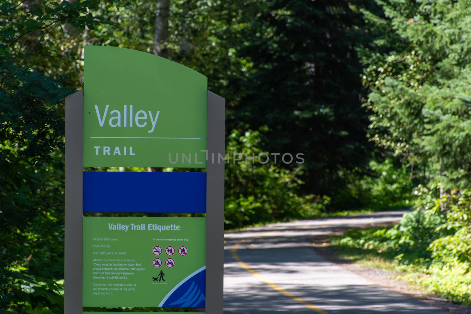 "Whistler, British Columbia/Canada - 08/07/2019:Valley Trail Sign in Whistler, British Columbia, Canada in the summer for biking, walking, running, rollerblading enjoying nature on the way to Whistler Village."